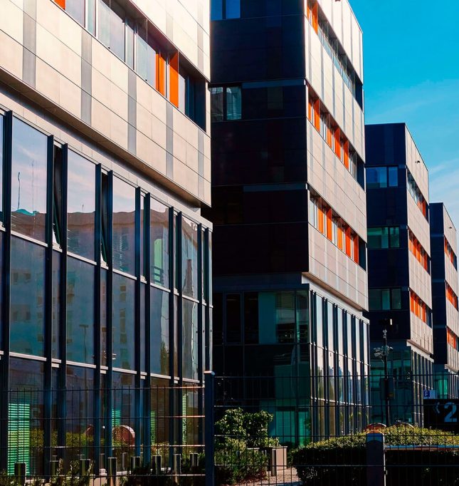 modern-office-building-with-green-trees-2025-04-02-08-39-59-utc (1) (1)